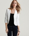 The white jacket: an essential spring item for your capsule collection. Sure to become a seasonal staple, wear it over a tee with denim or drape it over your shoulders when you head to your cocktail party.