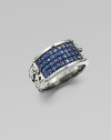 A tapered design in rhodium plated sterling silver is defined by four rows of tiny blue sapphires.Sterling silverBlue sapphiresAbout 1½ diamImported