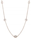 Layer yourself with inches of sparkle. This delicate necklace is crafted in 14k rose gold over sterling silver, with round-cut white topaz stations (4 ct. t.w.). Approximate length: 17 inches.