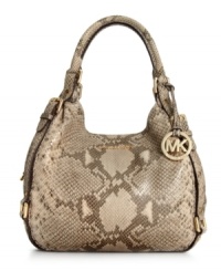 An absolute snake charmer, this posh python-embossed leather tote from MICHAEL Michael Kors is the accessory of the season. Soft leather is adorned with golden buckle and stud accents, while the roomy interior provides three separate compartments to keep you organized on-the-go.