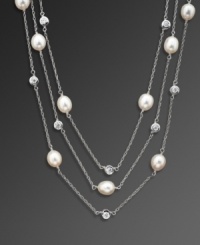 Add a little illumination with this elegant illusion necklace by CRISLU. Feature three delicate strands of bezel-set cubic zirconias (4-3/4 ct. t.w.) and freshwater pearls (8 mm). Set in platinum over sterling silver. Approximate length: 48 inches.