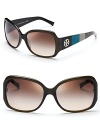 Nail one of this season's top trends in Tory Burch's colorblocked sunglasses. Stand-out olive, turquoise and gray sides feature Tory's signature logo.