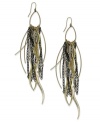 Linear accents of two-tone metal create a captivating earring design from Bar III. Crafted in antiqued gold tone mixed metal. Approximate drop: 4-3/4 inches.