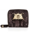 Take a walk on the wilder side with this python print wallet from Juicy Couture. Crafted in plush velour with rich leather trim and signature golden hardware, it's the perfect way to stay exotically organized.