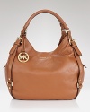 An essential shoulder bag from MICHAEL Michael Kors in goes-with-everything python leather.