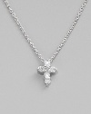 From the Tiny Treasures Collection. Demure in size but not in sparkle, a graceful cross hangs from a chain of 18k white gold. Diamonds, 0.11 tcw 18k white gold Chain length, about 16 Pendant length, about ¼ Lobster clasp Made in Italy