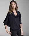 A drapey, seductive cowlneck falls easily at the neck on this Velvet by Graham & Spencer top. Team with your favorite jeans for a relaxed daytime look.