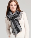 Patterned with a tonal check print in sumptuous shades of gray, Burberry's wool-cashmere scarf is a luxe must.