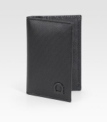 A slim look that fits smoothly inside a jacket pocket, designed in stamped calfskin leather with signature gancio detail. Signature gancio ornament Two credit card slots 4½ X 3 Made in Italy 