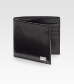 Sleek design in Italian leather with metal logo accent.Two billfold compartmentsEight card slotsLeather4¼W x 3¾HMade in Italy