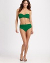 A high-waist design that offers style options. It can be worn under the navel or sit low on hips. Side ruching offers a flattering silhouette.Stretch comfortHigh-waist can also be folded under navel or worn low on hipFull coverageFully lined84% polyamide/16% elastaneHand washImported Please note: Bikini top sold separately. 