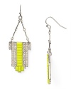 Electric shades are a bright way to accent every look, and these neon earrings from Aqua are wholly head-turning. We love this pair's chunky look - rock them against a neutral palette for a color-pop contrast.