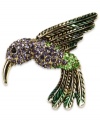 Fashion that moves fast, by Jones New York. This darling pin is styled in a hummingbird design and is embellished with colorful glass accents. Crafted in gold tone mixed metal. Approximate length: 1-3/4 inches. Includes gift box.