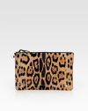 A smooth leather zipper accent is the perfect finishing touch on this ultra-chic compact shape of leopard-printed pony hair. Top zip closure with leather pullCotton lining11½W X 7½H X ½DImported