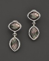 Black mother-of-pearl doublets in gleaming caviar settings of sterling silver.