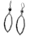 No look is complete without the right finishing touches. T Tahari's elegant leaf-shaped drop earrings feature a unique cut-out design set in hematite tone mixed metal. Base metal is nickel free for sensitive skin. Approximate drop: 3 inches.