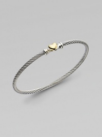 From the Cable Heart Collection. A thin signature cable band with a delicate 18K gold heart.Sterling silver 18K yellow gold Width, about 3mm Hook closure Imported 