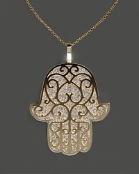 Diamond Hamsa pendant necklace in yellow gold.