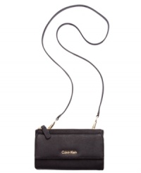 Classic styling with modern versatility, this Saffiano leather lovely from Calvin Klein converts from a casual crossbody to elegant evening bag in just two clicks. Outfitted with signature hardware and detailed stitching, it's the perfect day-to-night design.