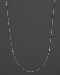 Diamonds and dark amethysts dot a sterling silver chain. By Ippolita.