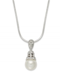 Eliot Danori's darling pendant necklace lends a shimmering mix of simulated pearls (10 mm) and glass crystals. Set in rhodium-plated mixed metal. Approximate length: 16 inches + 2-inch extender. Approximate drop: 1/2 inch.