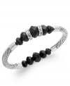 Simply elegant. This stretch bracelet from Charter Club is crafted from silver-tone mixed metal with black beads and glistening accents adding a distinguished touch. Approximate diameter: 2-1/2 inches.