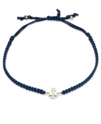 Anchors aweigh! This trendy wrap bracelet features a 14k gold anchor charm strung from a navy blue nylon rope cord. Approximate diameter: 2-1/4 inches (extends to 3-1/2 inches).