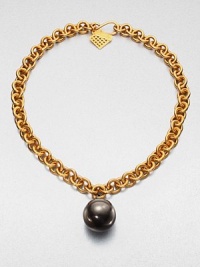 A large gunmetal-finished sphere on an 18k goldplated link chain. Brass18k goldplated brassLength, about 20Pendant size, about 1Hook closureMade in USA 