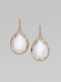 A bold faceted teardrop of clear quartz shimmers within a delicate setting of 18k gold. Clear quartz 18k yellow gold Drop, about 1½ Ear wire Imported