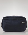 Rugged, stylish and roomy, the canvas toiletries bag is ready to see the world.