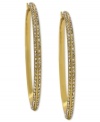 Go big and bold. These hoop earrings from Vince Camuto are crafted from gold tone mixed metal and feature rows of clear glass accents adorning the outside. Approximate drop: 3-1/4 inches.