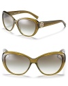 Tory Burch's cat eye sunglasses offer classic styling with rich details that focus on the iconic Tory Burch round logo. Nose tabs help to secure fit.