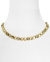 A refined take on rock chic, this House of Harlow 1960 necklace traces the neck in chunky, engraved gold-plated beads.