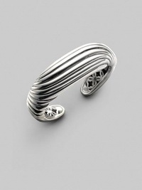 A sensuously curved fluted cuff of polished sterling silver is a fresh take on Yurman's signature cable. Sterling silver Diameter, about 2¼ Width, about 1 Imported