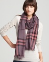 In a blush purple-and-pink Burberry check, this oblong scarf offers lightweight luxe with its sheer, gauzy fabrication.