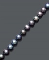 Add shimmer in iridescent pearl. A sleek row of black cultured freshwater pearls (7-8 mm) will add a touch of bold color to your wrist. Crafted in 14k gold. Approximate length: 7-1/2 inches.