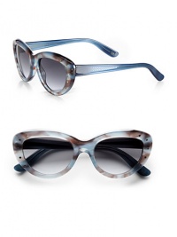 A smaller version of the 1950's-inspired, cat's-eye-shaped, lightweight acetate frames for retro glamour. Available in blue with gray gradient lens or honey with brown gradient lens.Plastic temples100% UV protectionMade in Italy 