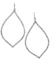 Flower petal-shaped sparklers. These silver tone mixed metal earrings by Fossil are covered in clear crystal pave and have a fish wire closure. Approximate drop: 2-3/4 inches.