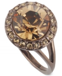 Terrific in topaz. This ring from Givenchy is crafted from brown gold-tone mixed metal with light Colorado topaz glass stones making a strong statement. Size 7.