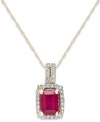 A touch of crimson. This brilliant-hued pendant features an emerald-cut ruby (1 ct. t.w.) surrounded by round-cut diamonds (1/5 ct. t.w.). Set in 14k gold. Approximate length: 18 inches. Approximate drop: 5/8 inch.