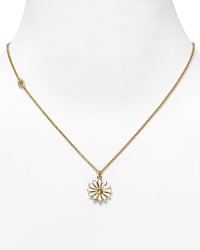 14 kt. yellow gold-plated brass. Gift boxed. Lobster clasp. White enamel daisy pendant with yellow crystal center.