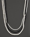 A beautiful blend of fresh water pearl in two sizes and a nested strand of black onyx beads.