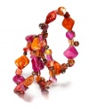 Fiery hot hues add just the right touch. Style&co.'s three bracelet set combines bright orange shells and wooden beads in a slip-on stretch setting. Crafted in oxidized brass tone mixed metal. Approximate length: 7 inches.