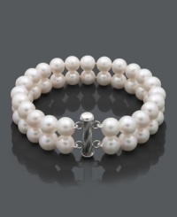 Provide your wardrobe with a timeless piece. This sophisticated bracelet features two rows of pretty cultured freshwater pearls (8-1/2-9-1/2 mm) in a sterling silver setting. Approximate length: 8 inches.