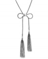 Dust off your shoulders with this pretty tassel necklace from BCBGeneration. An open bow pendant display two fringe chains for a sweeping effect. Crafted in silver tone mixed metal. Approximate length: 17 inches. Approximate drop: 8 inches.