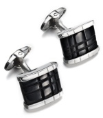 Sleek & refined. These rectangular-shaped cuff links make the favorite accent to his best work shirt. Crafted in sterling silver, an engraved onyx stone decorates the center (10-3/4 ct. t.w.). Approximate length: 13/16 inch. Approximate width: 5/8 inch.