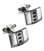 Complement his power suit. These dynamic cuff links features a unique rectangular shape accented by onyx (1-3/4 ct. t.w.) and hematite stone. Set in sterling silver. Approximate length: 7/8 inch. Approximate width: 5/8 inch.