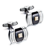 A little bit of everything. These sophisticated cuff links feature a rounded rectangular shape with a round-cut diamond center (1/2 ct. t.w.), onyx backdrop (10-3/4 ct. t.w.) and sterling silver setting with 14k gold accents. Approximate length: 3/4 inch. Approximate width: 7/16 inch.