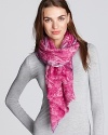 Juicy Couture's python print scarf goes ultra-glam with metallic-trimmed edges.