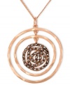 Add some glitter and glam to your look. Genevieve & Grace's pretty graduated circle drop pendant features sparkling marcasite in 18k rose gold over sterling silver. Approximate length: 18 inches. Approximate drop: 1-11/16 inches.